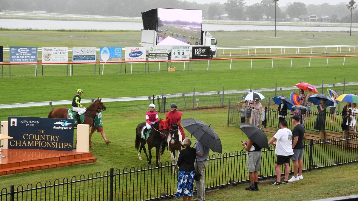Rain drenched the Tuncurry track on the day of the running of the Mid North Coast Country Championship Qualifying race in February.