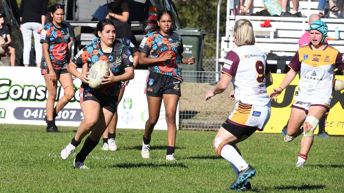 Tquile Singh takes the ball up for the Group Three Indigenous All Stars women's side in the clash against Group Three All Stars last season.