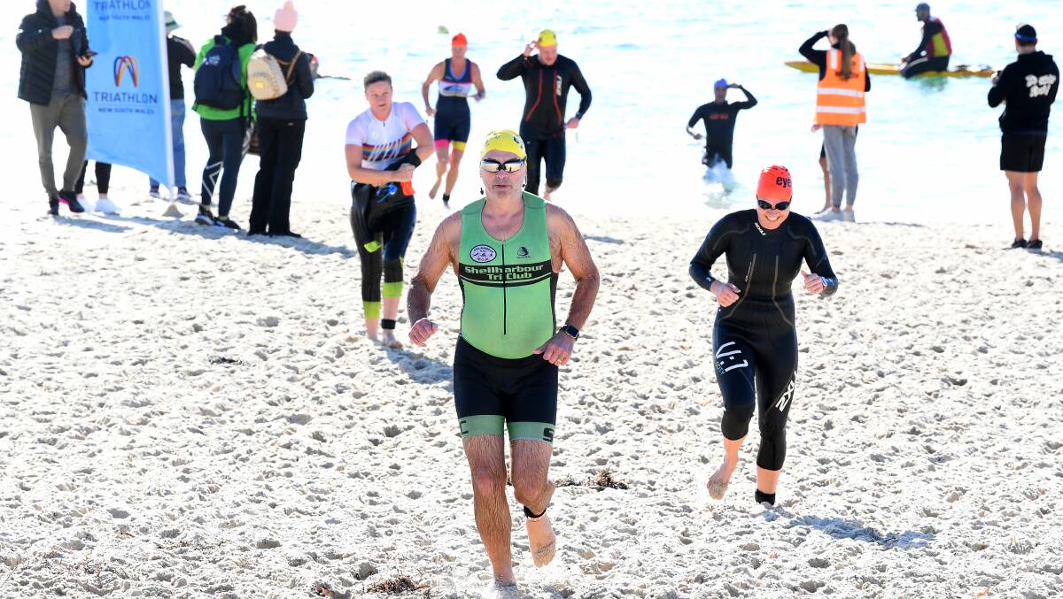 Triathletes complete the surf swim leg at Forster Main during last year's NSW club championships. The 2024 event will be held on Saturday. 