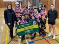 Tanya Thompson presents a grant cheque to Great Skates Roller Derby League players. Picture supplied.