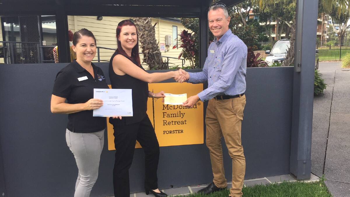 The Commonwealth Bank's Liz Algie presented a cheque for $10,000 to retreat coordinator, Rhiannon Curtis and Ronald McDonald Northern NSW CEO Ross Bingham.